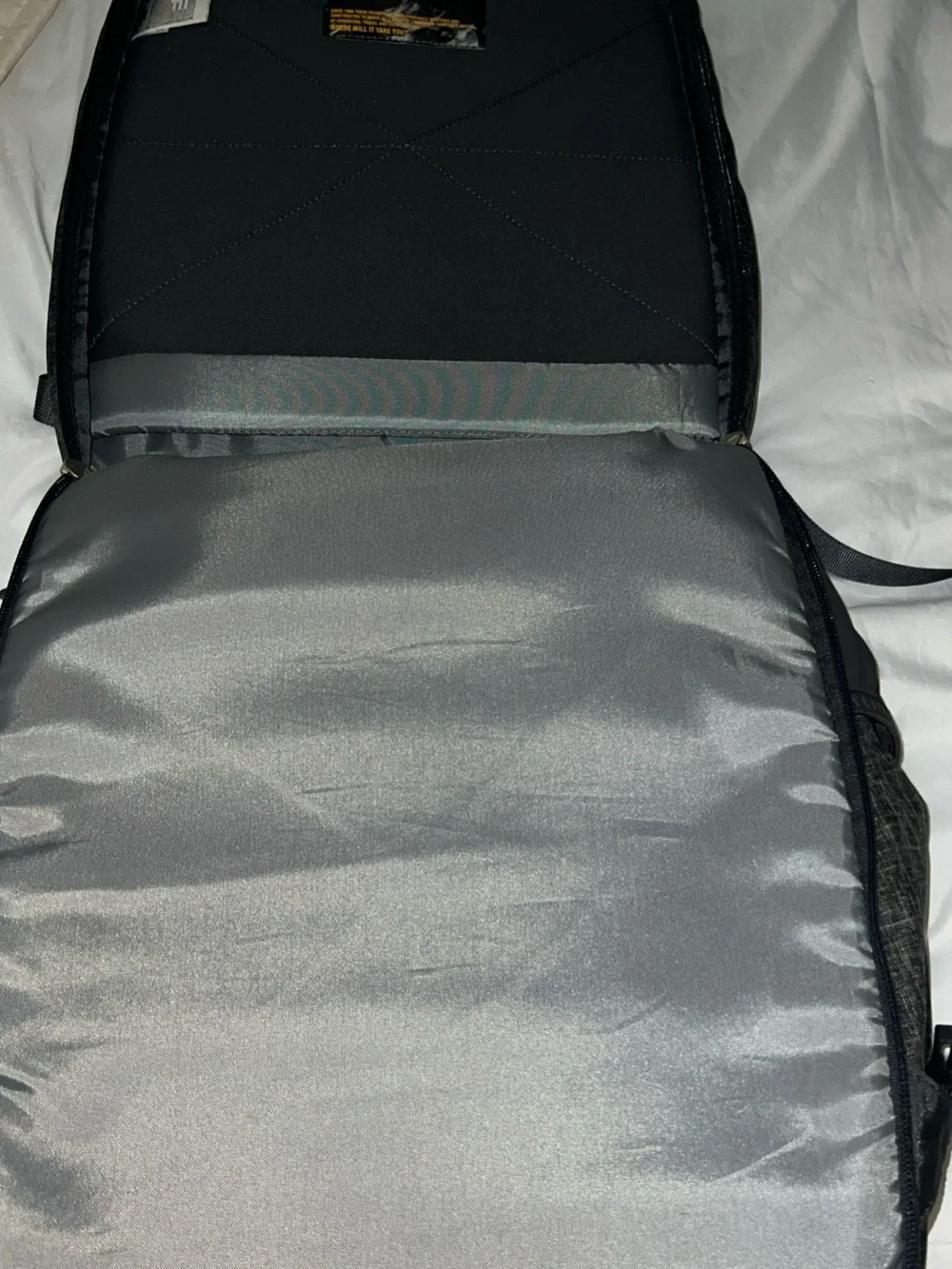 The North Face Black Backpack with Light Gray-Green Accents